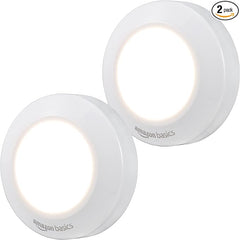 Amazon Basics LED Puck Lights, Battery Operated, 50 Lumens 2 Pack, Tap Light, Stick on Lights, Under Cabinet Lighting, Ideal for Kitchen Cabinets, Closets, Garage and More, White