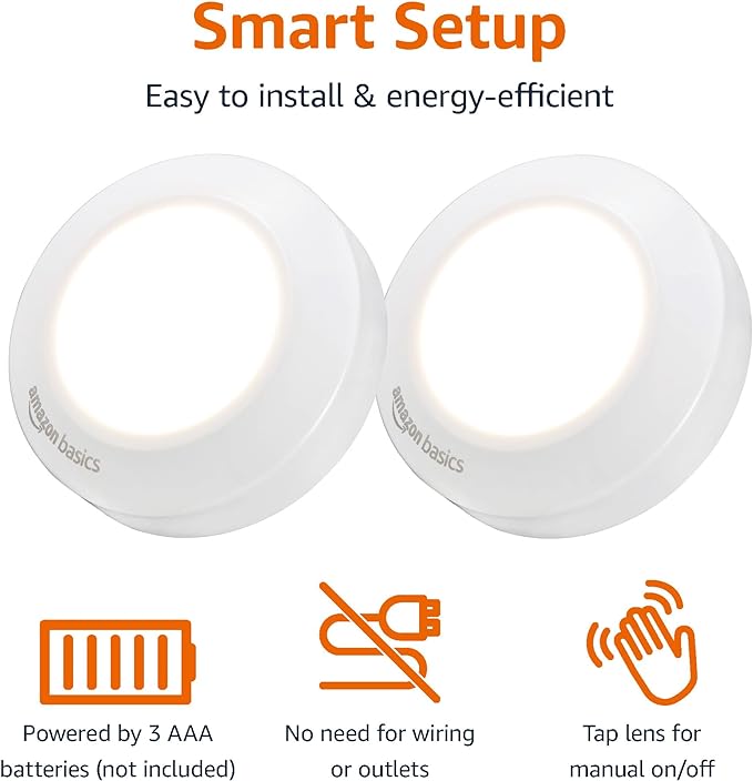 Amazon Basics LED Puck Lights, Battery Operated, 50 Lumens 2 Pack, Tap Light, Stick on Lights, Under Cabinet Lighting, Ideal for Kitchen Cabinets, Closets, Garage and More, White