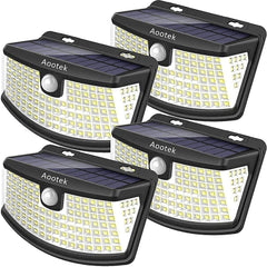 Aootek Nuevas luces solares de 120 LED con reflector de luces, gran angular de 270°, impermeable IP65, luces de seguridad fáciles de instalar para puerta delantera, patio, garaje, terraza (paquete de 4)